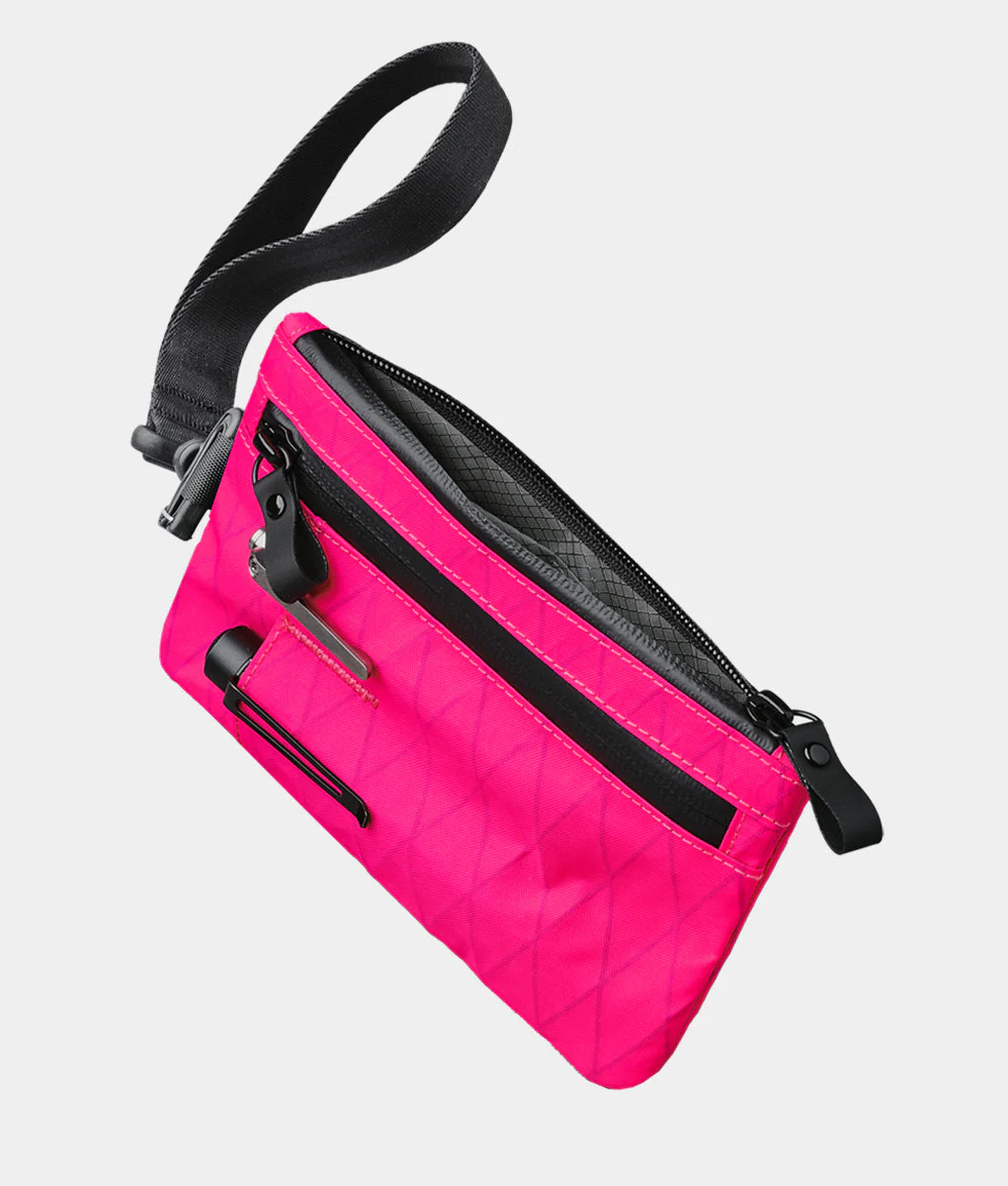 79-zip-clutch-hot-pink-rvx20-1.webp Zip Clutch - Hot Pink RVX20